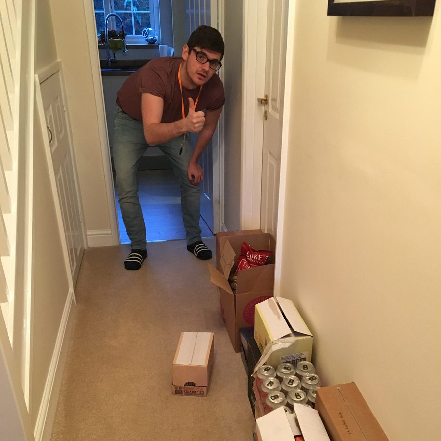 Boxes of stock stacked in a hallway in the early days of Food Circle